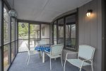 Screened porch with outdoor table